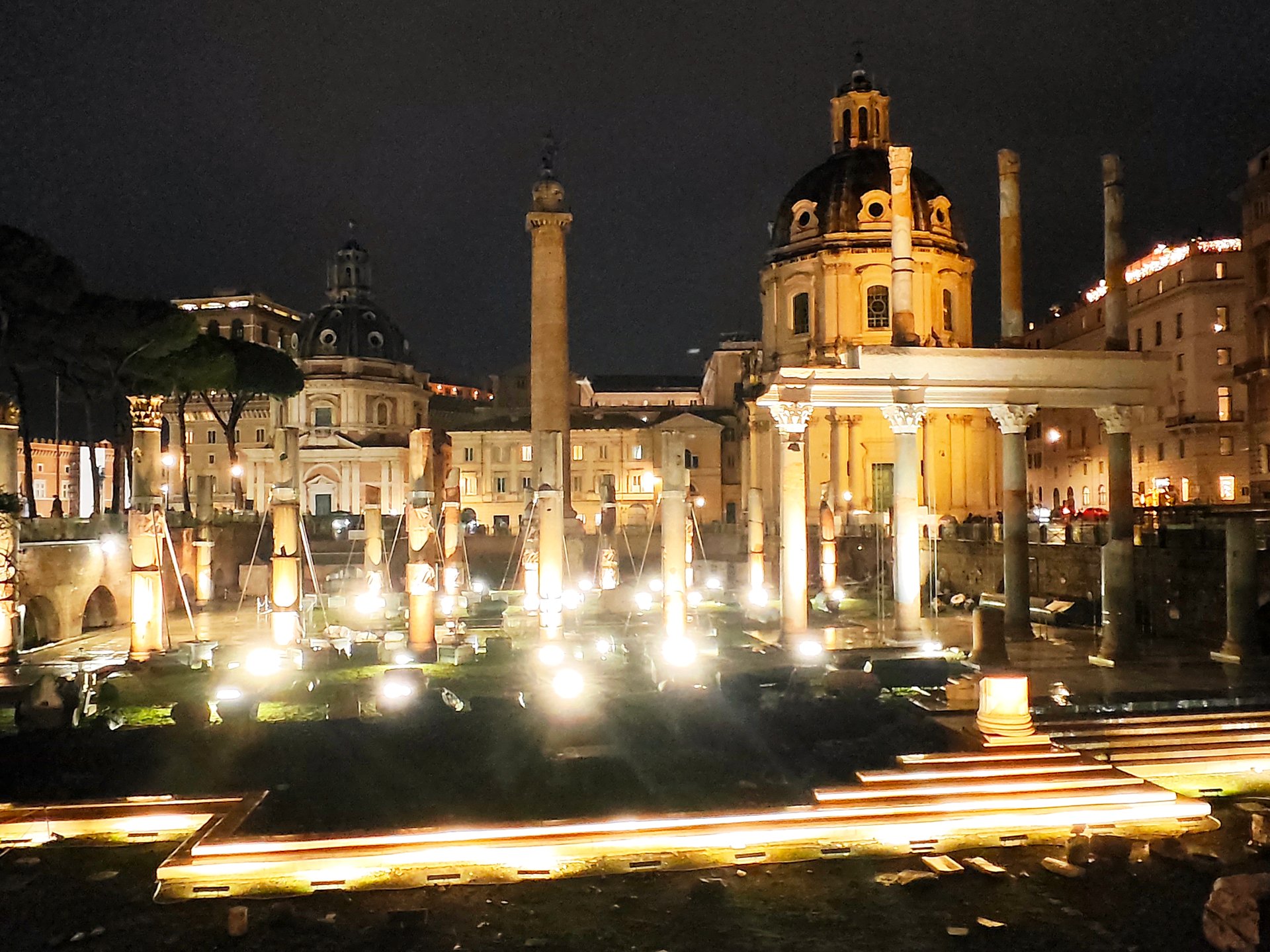 The illuminated Trajan’s Column in the night